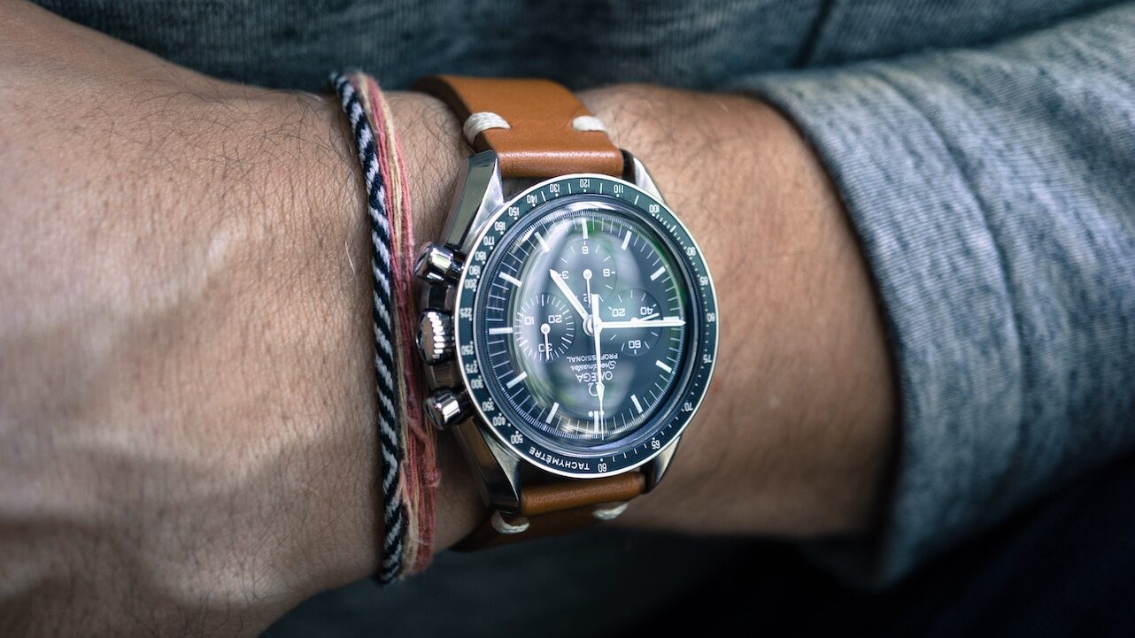 Omega luxury watch on man's wrist