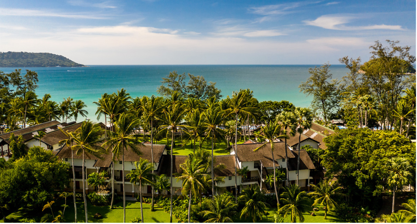 Palm trees and hotel rooms at Club Med Phuket