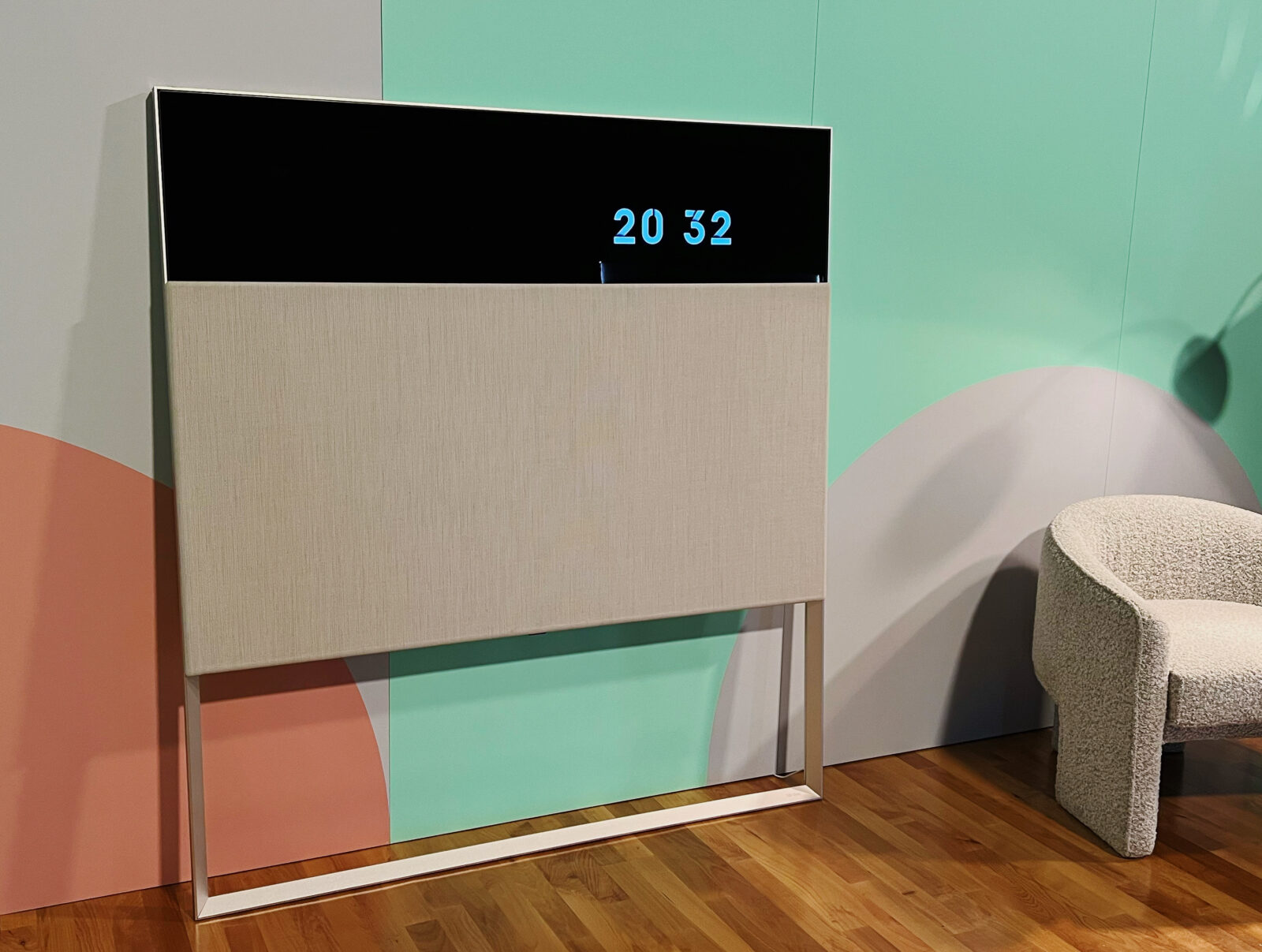 LG ART90 OLED lifestyle TV against a wall