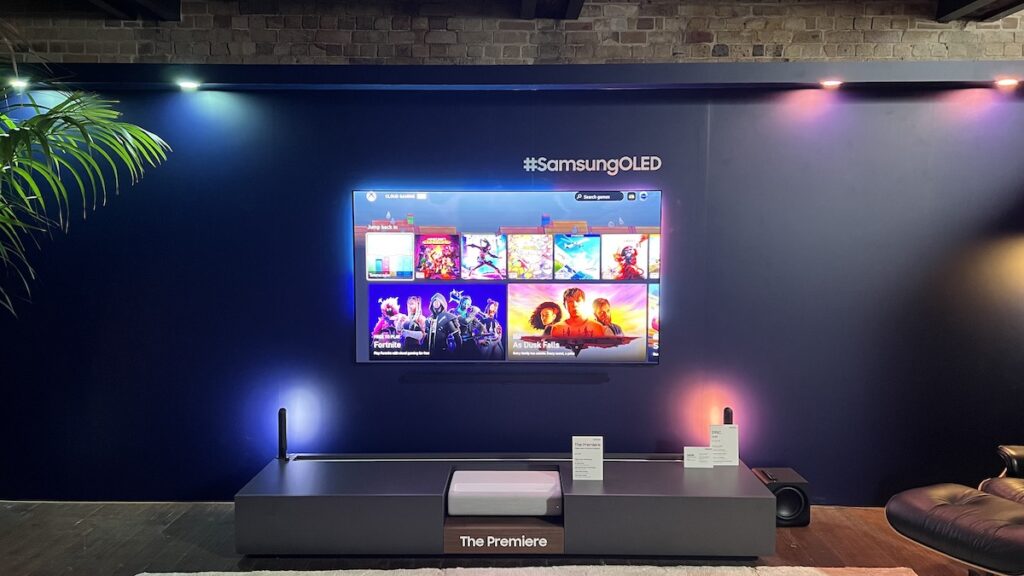 A Samsung OLED hanging on the wall displaying Xbox cloud games available to play